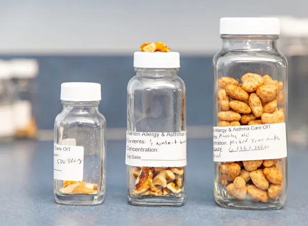 Labeled jars of measured food allergen doses used for immunotherapy